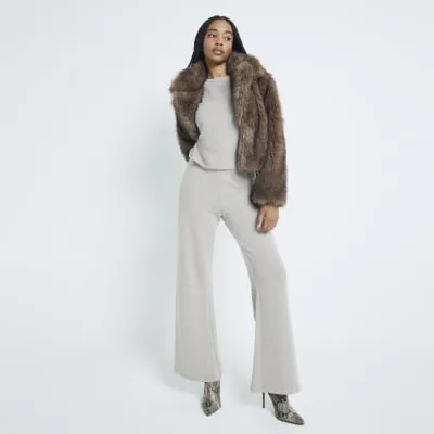 Gold metallic wide leg knit trousers sold by River Island