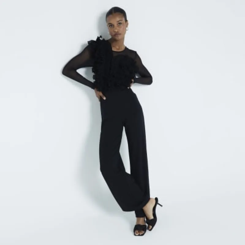 Black Mesh Frill Front Jumpsuit sold by River Island
