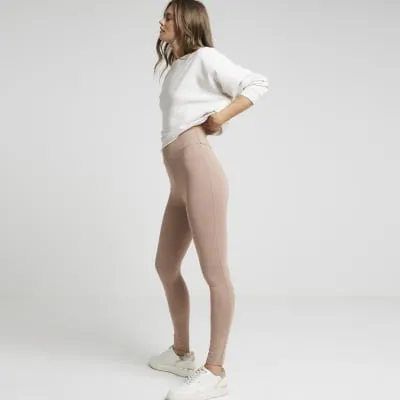 Beige camel high waisted leggings sold by River Island