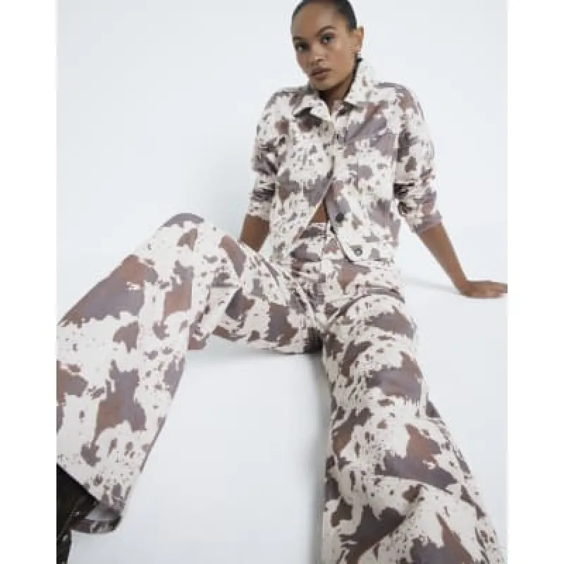 Brown Cow Print Relaxed Straight Jeans sold by River Island