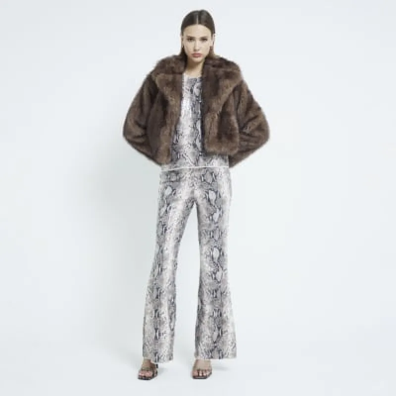 Beige Sleeveless Snake Print Sequin Tank Top sold by River Island