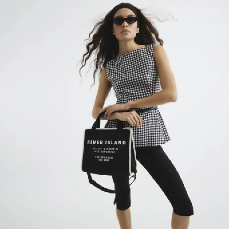 Black canvas embroidered Shopper bag sold by River Island