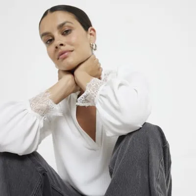 White Loose Fit Long Sleeve Lace Blouse sold by River Island