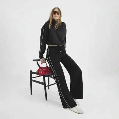 Black Wide Leg Side Stripe Joggers sold by River Island