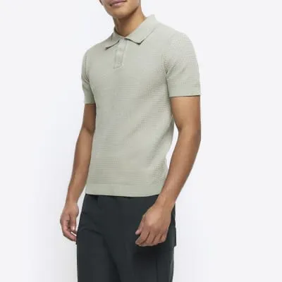 Green slim fit textured knit polo sold by River Island