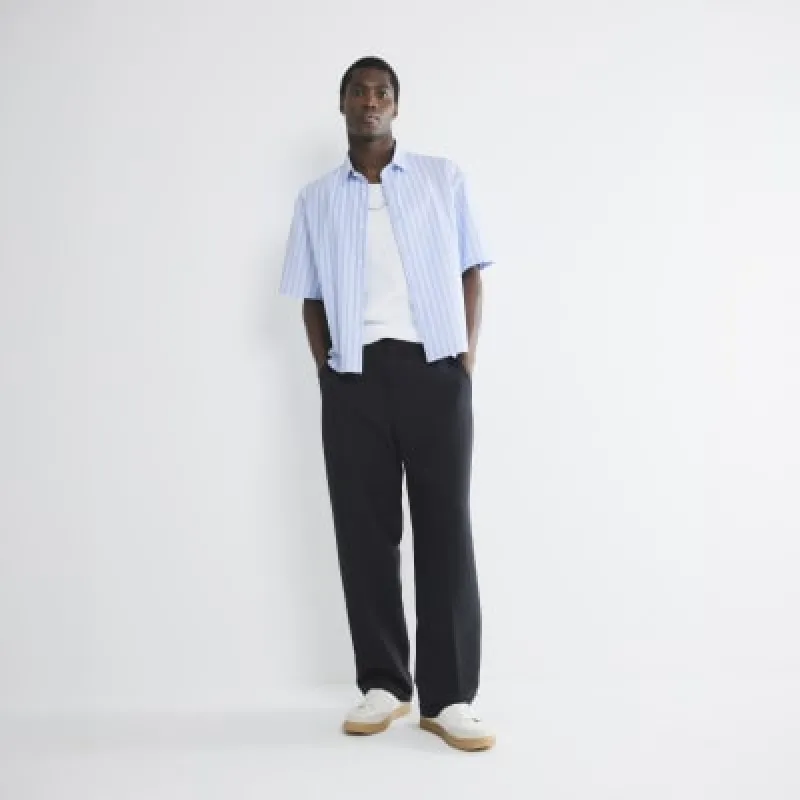 Navy Relaxed Fit Trousers made by River Island