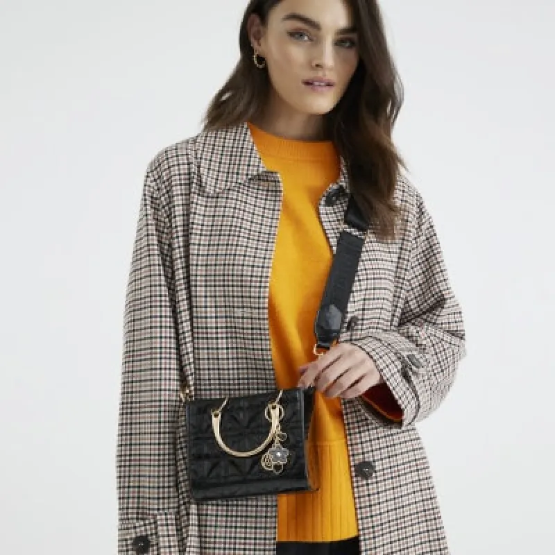 Black Quilted Charm Tote Bag sold by River Island