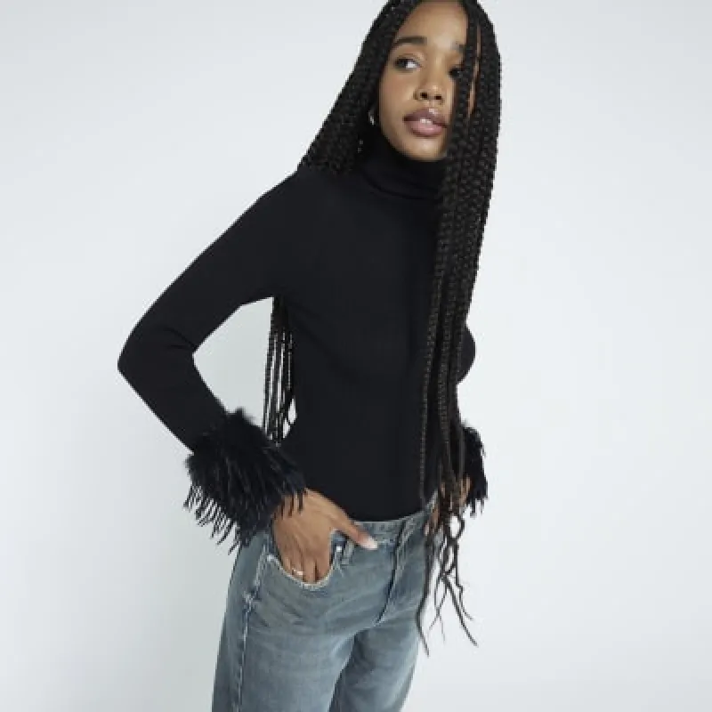 Black Long Sleeve Feather Cuff Roll Neck Top sold by River Island