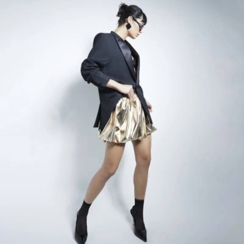 Gold Faux Leather Bubble Hem Mini Skirt sold by River Island