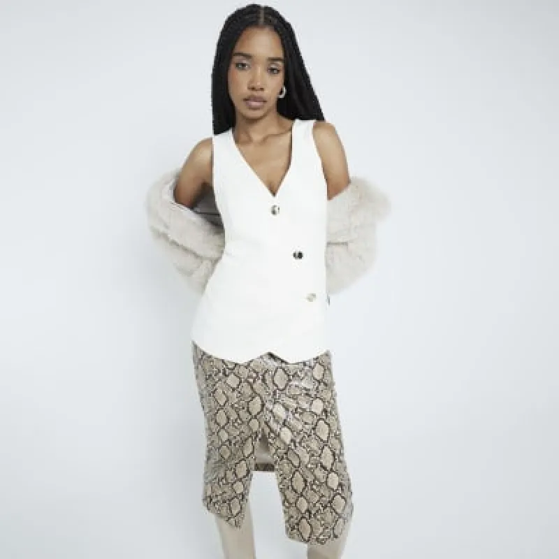 Cream Asymmetric Waistcoat sold by River Island