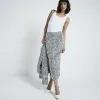 Silver sequin boucle pencil midi skirt sold by River Island