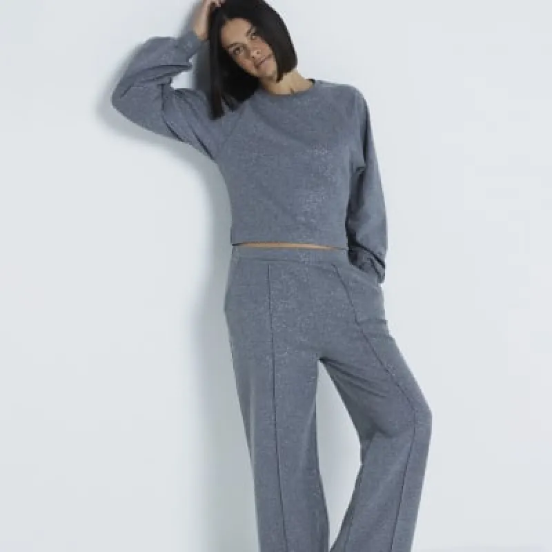Grey shimmer wide leg joggers sold by River Island
