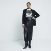 Black faux leather midi skirt sold by River Island