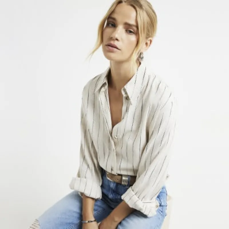 Beige linen blend embroidered crop shirt sold by River Island