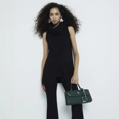 Black Sleeveless Jumbo Roll Neck Top sold by River Island