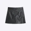 Petite Black faux leather pocket mini skirt sold by River Island
