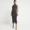 Black mesh spot ruched bodycon midi dress sold by River Island