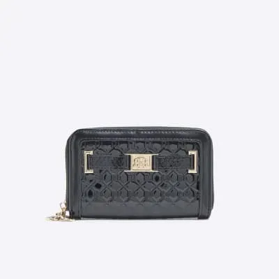 Black Ri Monogram Embossed Flower Charm Purse sold by River Island