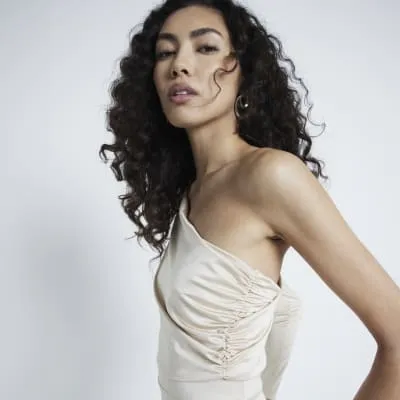 Cream One Shoulder Bodycon Dress sold by River Island