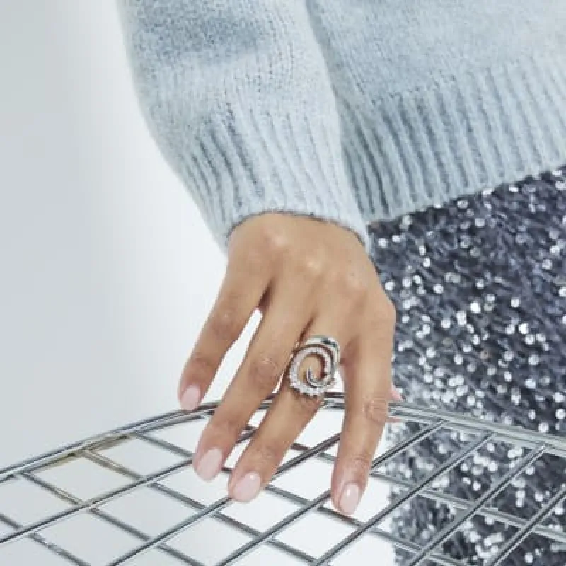 Silver Cubic Zirconia Swirl Statement Ring sold by River Island