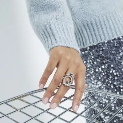 Silver Cubic Zirconia Swirl Statement Ring sold by River Island