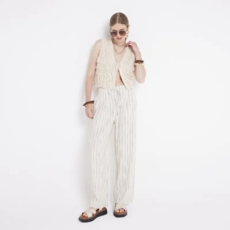 Beige linen blend stripe wide leg trousers sold by River Island