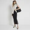 Black ribbed taped midi skirt sold by River Island