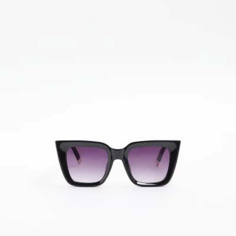 Black oversized cat eye sunglasses sold by River Island