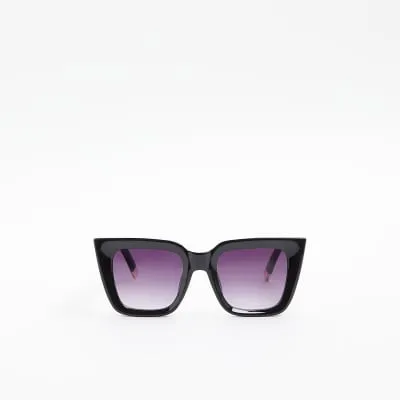 Black oversized cat eye sunglasses sold by River Island