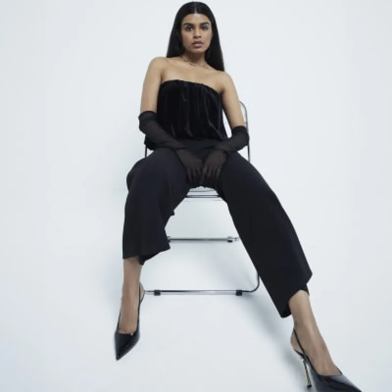 Petite Black Velvet Bubble Bandeau Jumpsuit sold by River Island