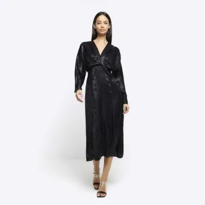 Black satin floral twist shift midi dress sold by River Island