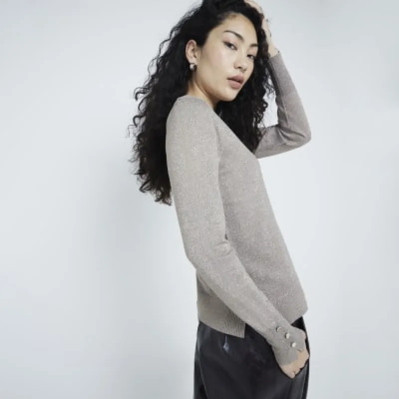 Gold Fine Knit Glitter Long Sleeve Top sold by River Island