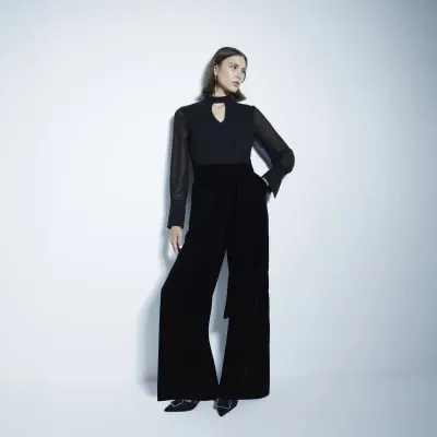 Black Long Sleeved Velvet Chiffon Jumpsuit sold by River Island