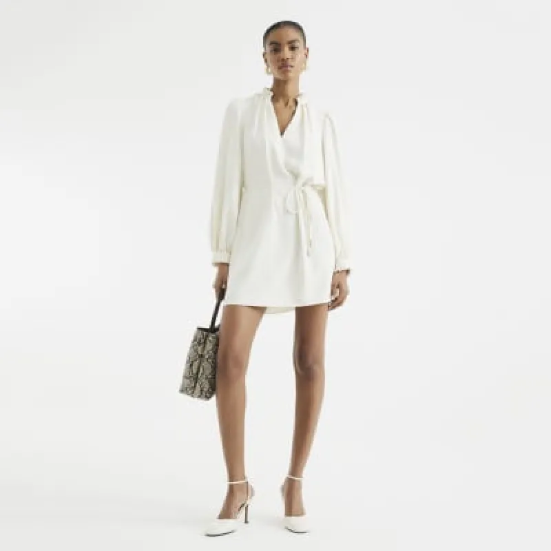 Cream Long Sleeved Belted Mini Dress sold by River Island