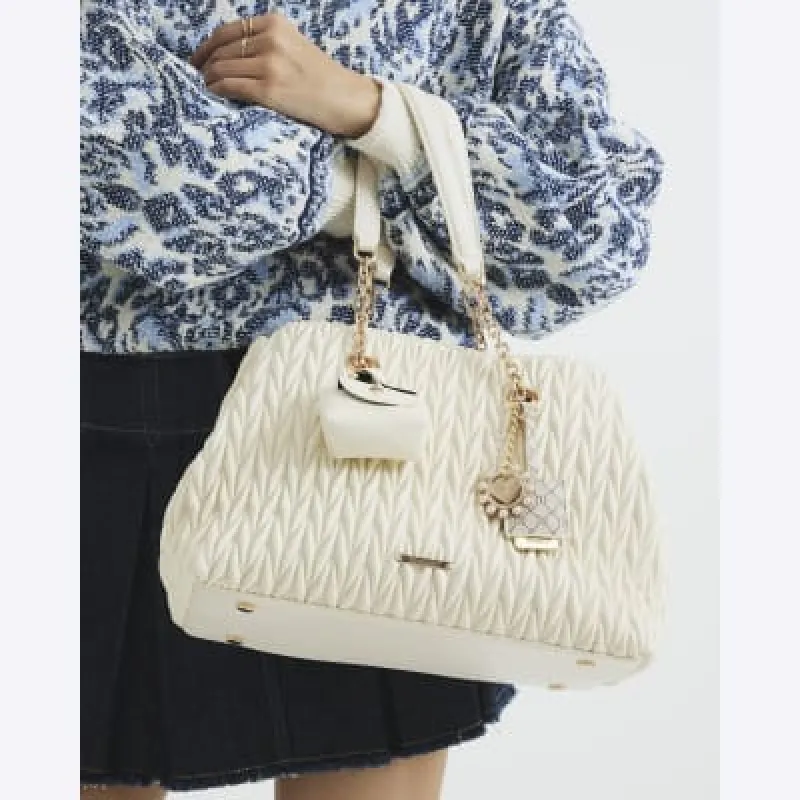 Cream Scrunch Quilt Charm Tote Bag sold by River Island