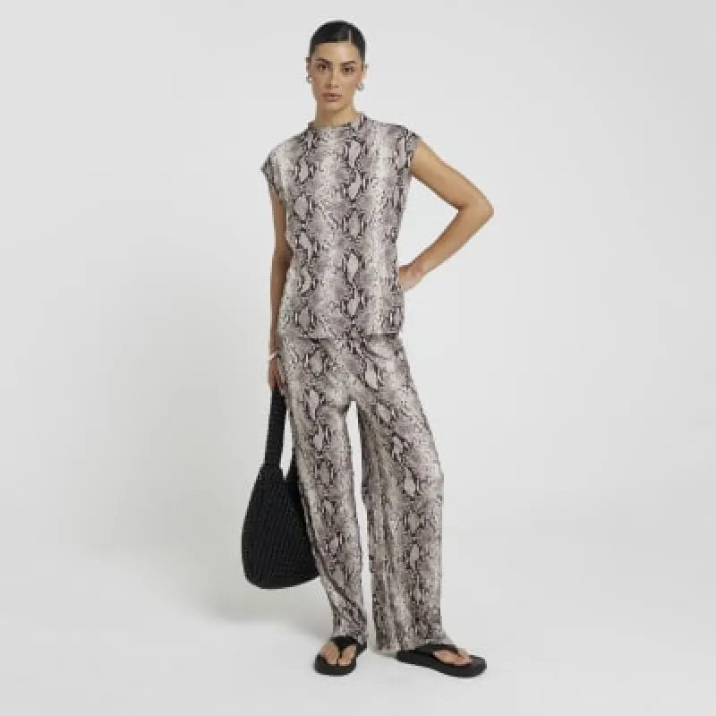 White snake print wide leg trousers sold by River Island