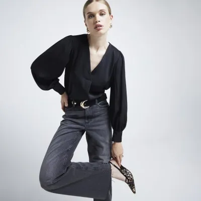 Black sheer sleeve satin top sold by River Island