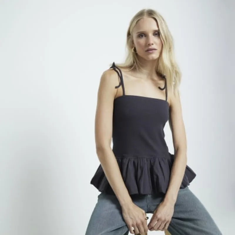 Grey frill peplum hem cami top sold by River Island