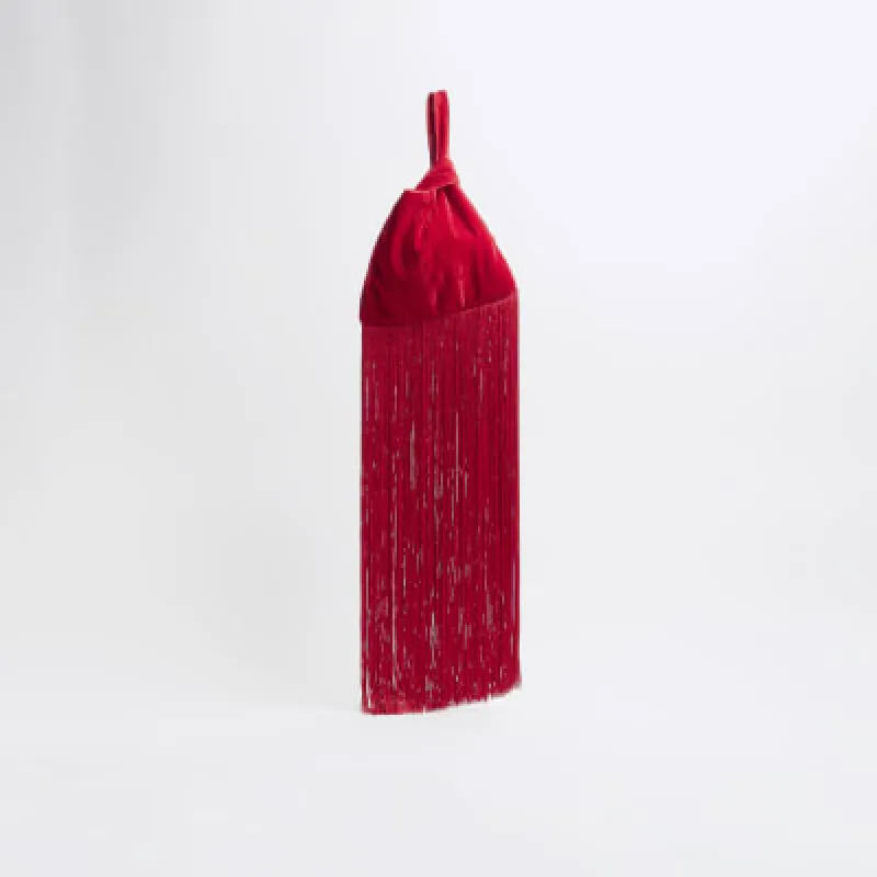 Red tassel clutch bag sold by River Island