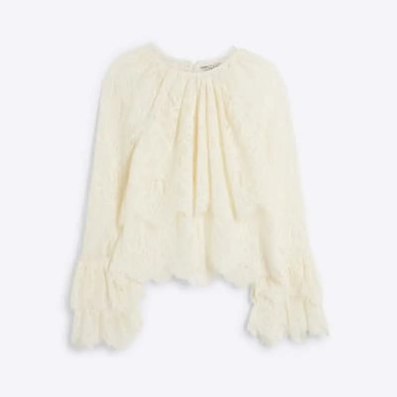 Petite cream lace frill blouse sold by River Island