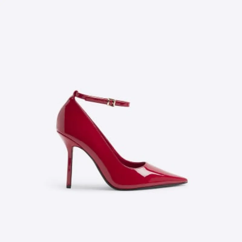 Red ankle strap heeled court shoes sold by River Island