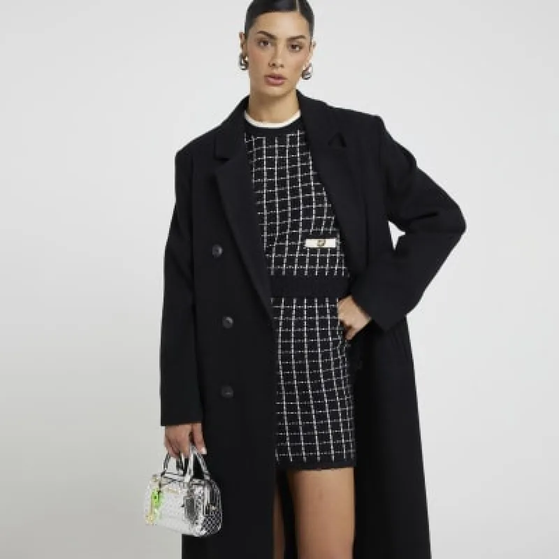 Black boucle check vest top sold by River Island