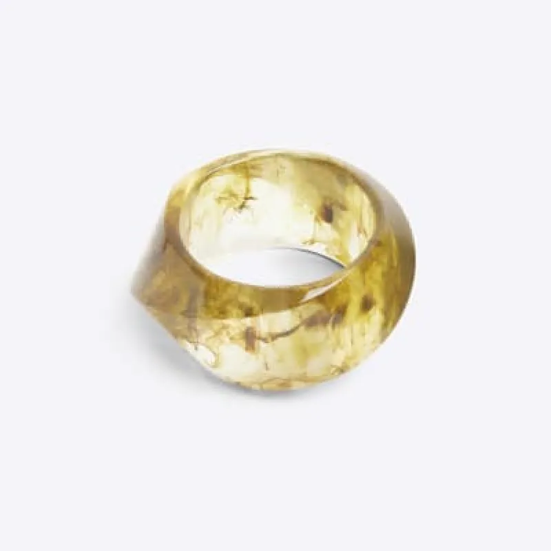 Green chunky resin bangle sold by River Island