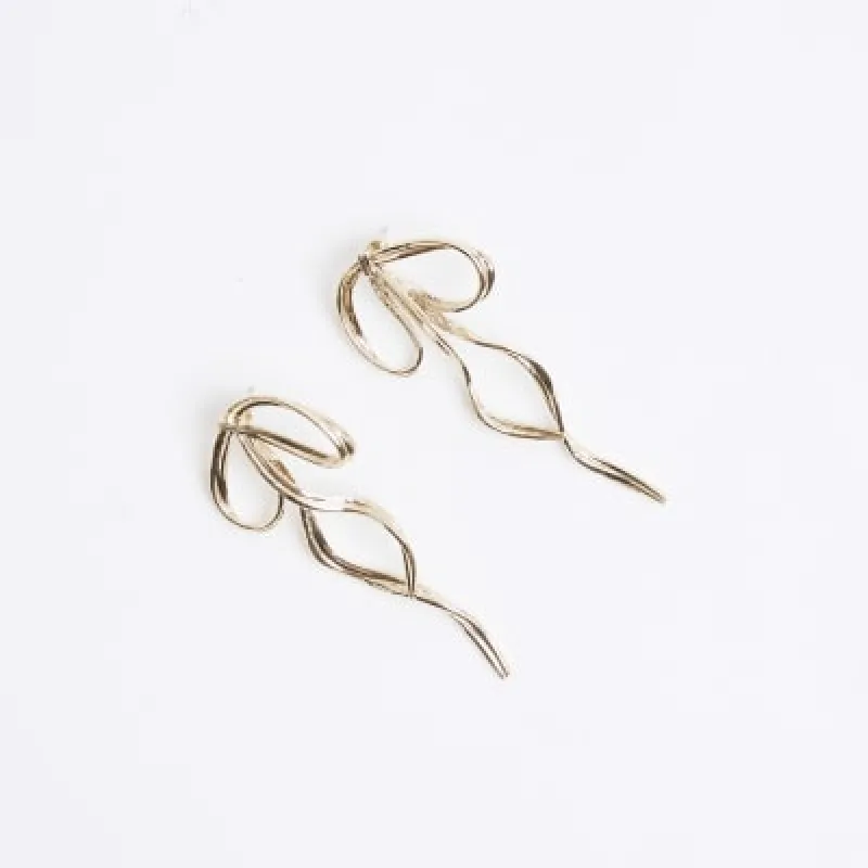 Gold gold bow drop earrings sold by River Island