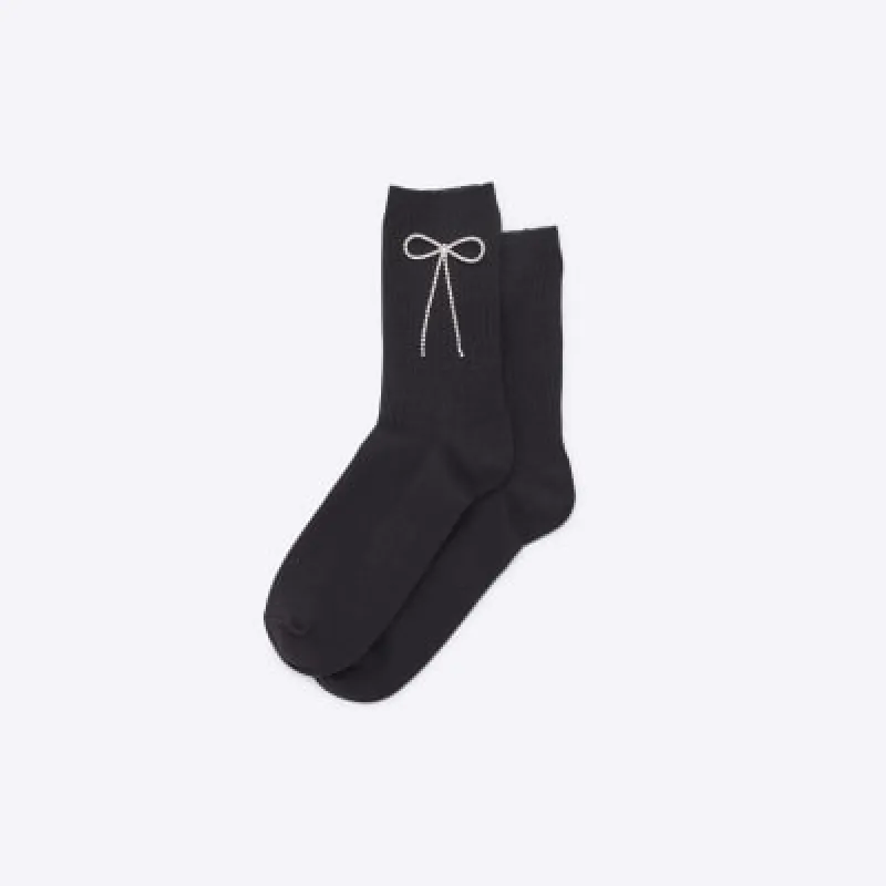 Black ribbed bow detail socks sold by River Island