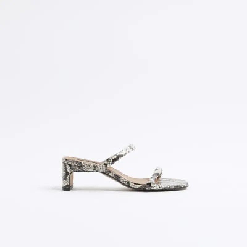 Beige kitten heel mule sandals sold by River Island
