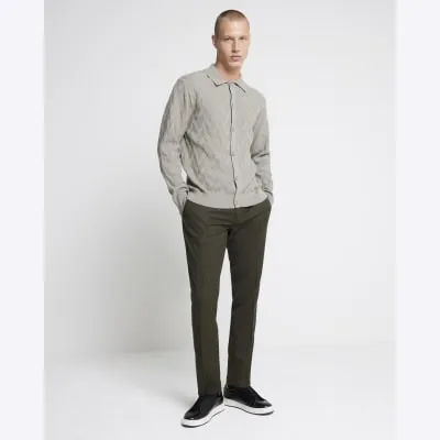 Green skinny fit suit trousers sold by River Island