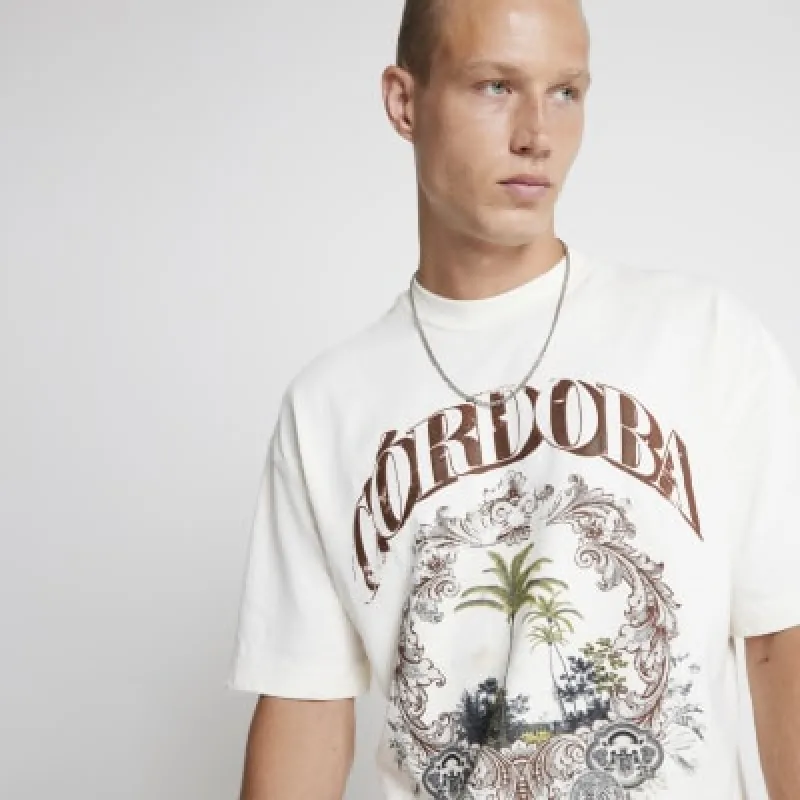 Cream oversized fit cordoba graphic t-shirt sold by River Island