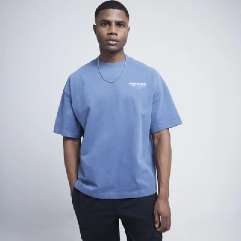Blue oversized fit graphic script t-shirt sold by River Island