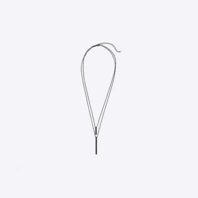 Black metal pendant necklace sold by River Island